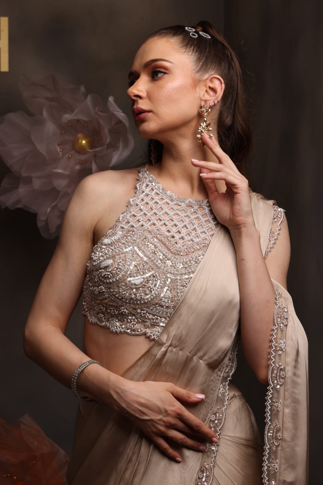 Champagne Satin Pre-Draped Saree with Hand-Embellished Halter Neck Blouse
