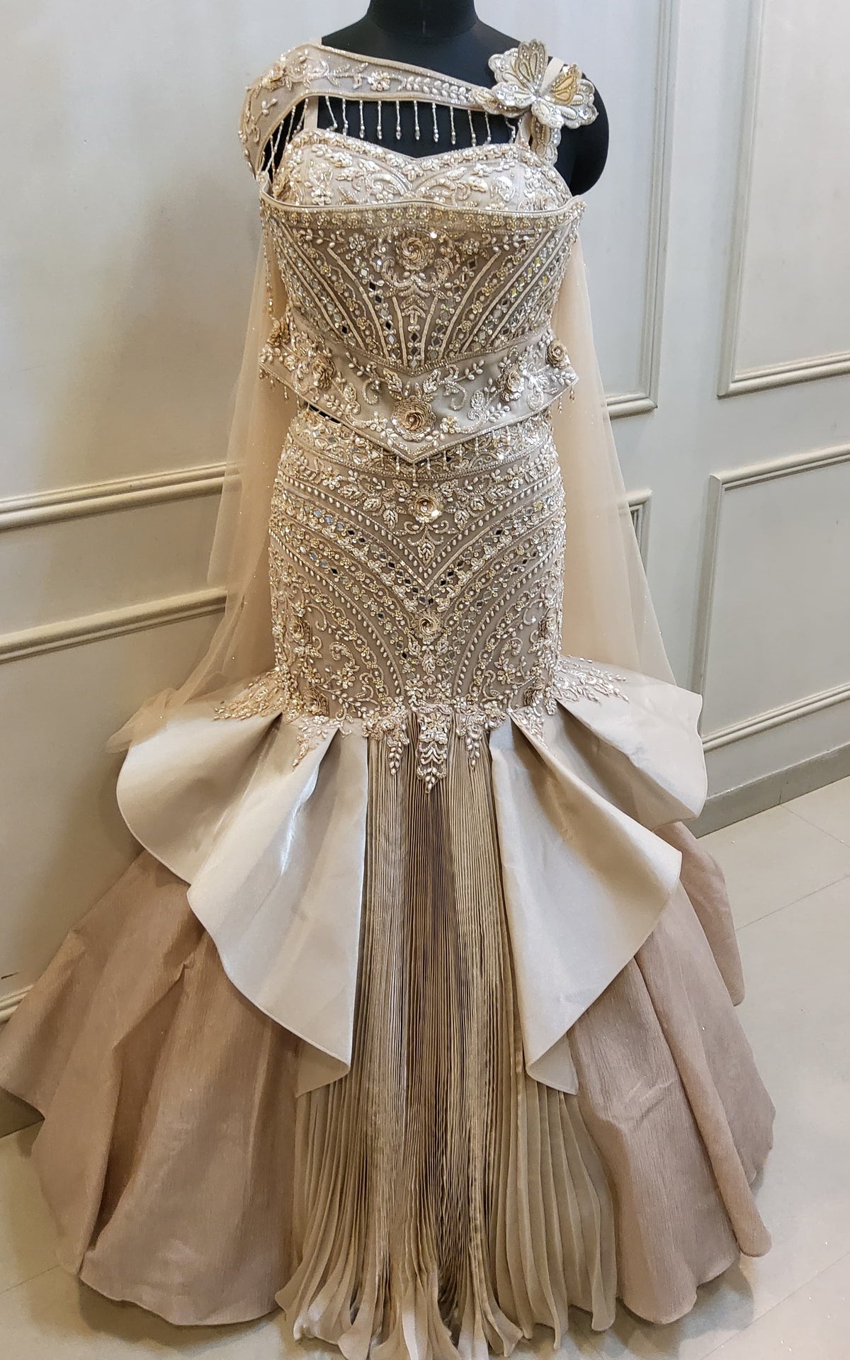 Champagne Gold Heavily Embellished Mermaid Lehenga Set with Peplum Corset & Architectural Pleats